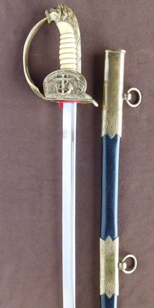 1st Model Navy Dagger, Third Reich Navy Sword, and Photo Album (#27274)